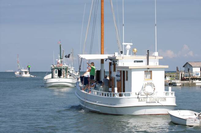 Oyster Buyboats departing Tangier Island