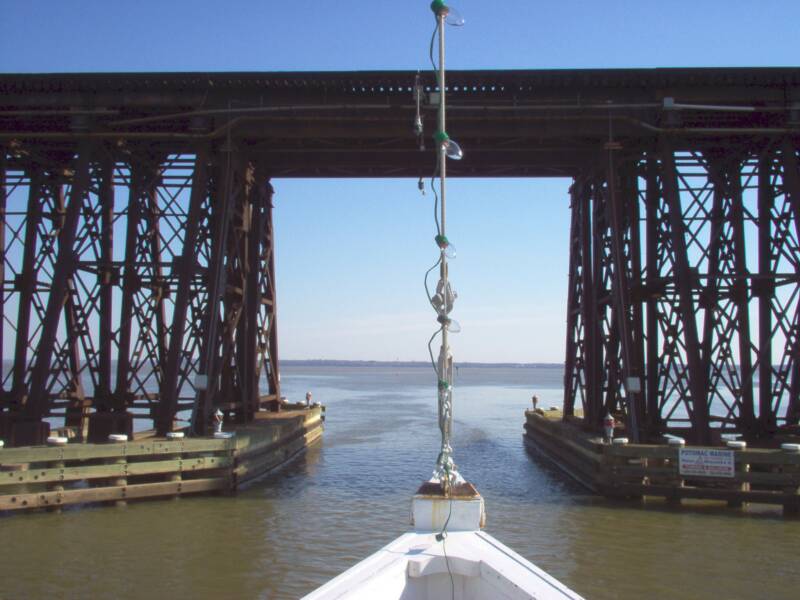 wooden oyster buyboat leaving neabsco creek.jpg