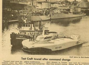 SES 100a along side a tug being positioned after Change of Command in Tacoma, Washington